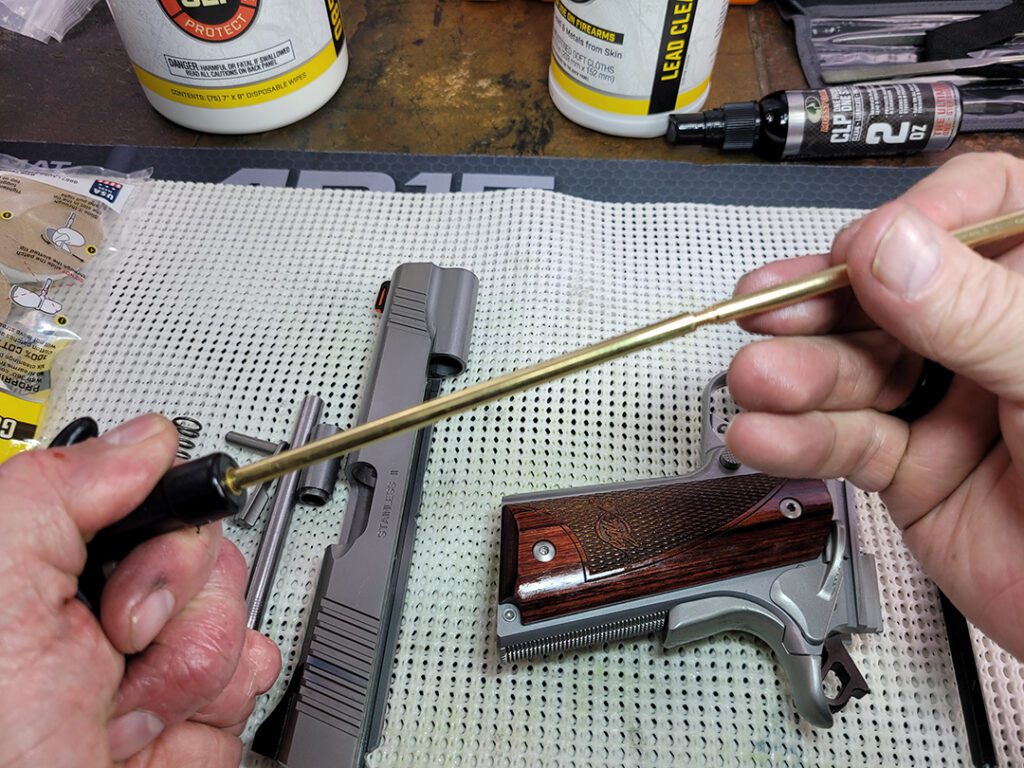 Adding handle to cleaning rod