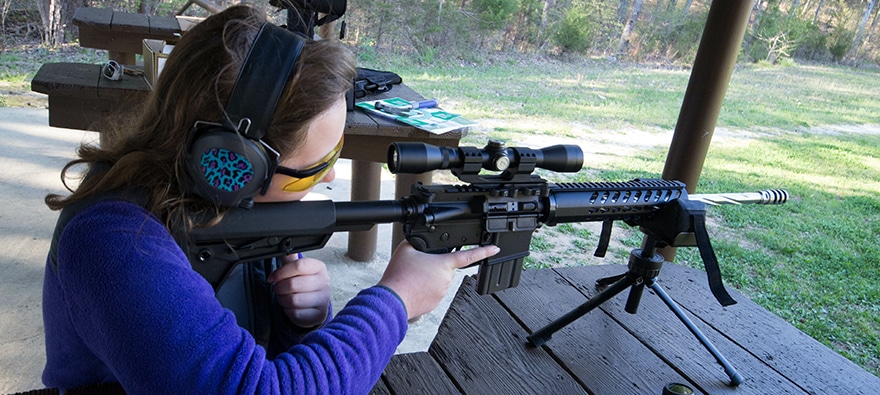 woman shooting an AR-15